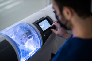 Doctor preparing a device for testing