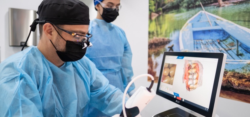 Dentist assessing reports of a patient on medical tour in Costa Rica